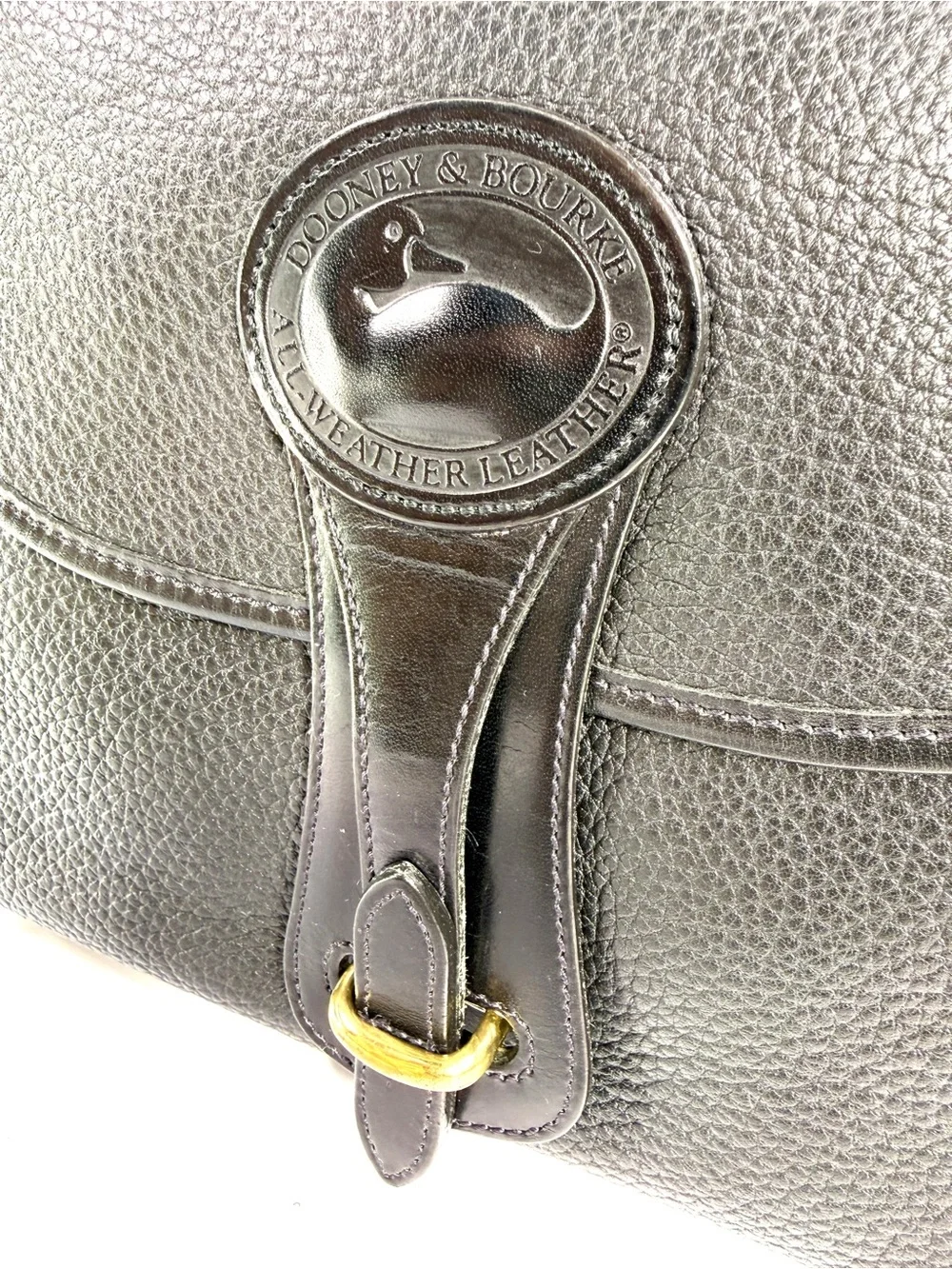 Dooney & Bourke Black Pebbled Leather Messenger with Gold-Tone Buckle
